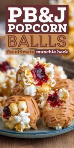 Delicious PB&J Popcorn Balls stacked on wax paper, coated in a sticky peanut butter and jelly glaze, with crushed peanuts for crunch. A fun and easy munchie snack, perfect for satisfying cravings, with an optional THC-infused twist